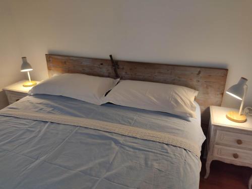 Postel nebo postele na pokoji v ubytování Casa Caminate - Oliveto