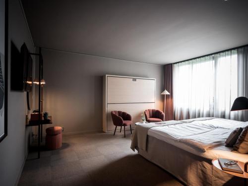 Säng eller sängar i ett rum på Spar Hotel Majorna
