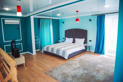 Ένα ή περισσότερα κρεβάτια σε δωμάτιο στο Nasha Dacha