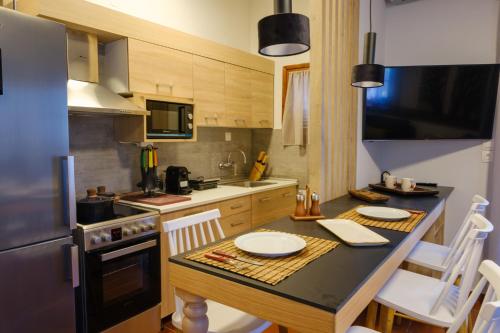 Una cocina o kitchenette en SANTA ANA studios