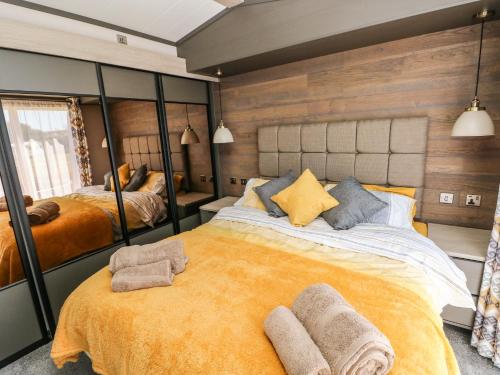 Postel nebo postele na pokoji v ubytování Puffin Lodge