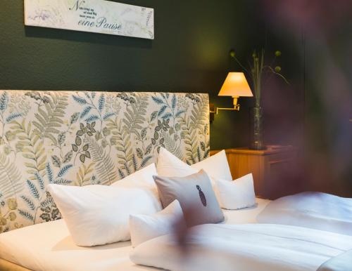 Ένα ή περισσότερα κρεβάτια σε δωμάτιο στο Hotel Schwarzwaldhof