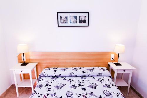 Postel nebo postele na pokoji v ubytování Ventura 4 Planet Costa Dorada