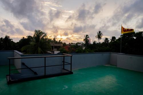 a view from the roof of a house with water at Western sky in Negombo