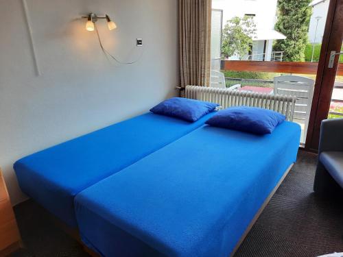 Katil atau katil-katil dalam bilik di Marx Motel