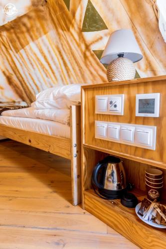 Letto o letti in una camera di Western Camp Resort