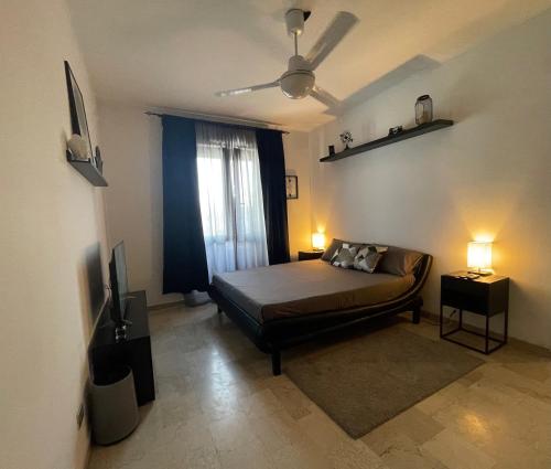 Postel nebo postele na pokoji v ubytování Appartamento Milano