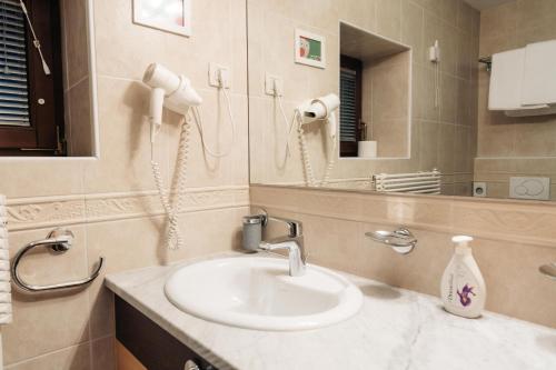 Ванная комната в Vila Podvin