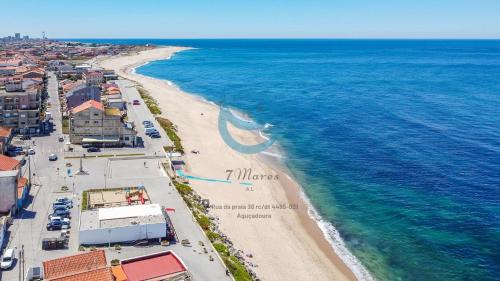 an aerial view of a beach and the ocean at 7 Mares in Póvoa de Varzim
