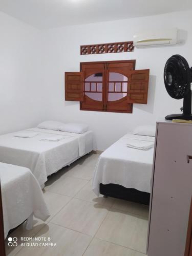 Postel nebo postele na pokoji v ubytování Casa em Maragogi