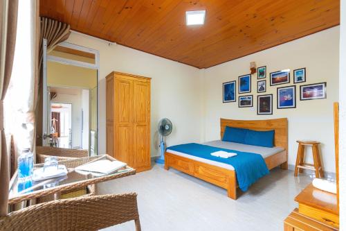 Postel nebo postele na pokoji v ubytování Gia Pham Hotel