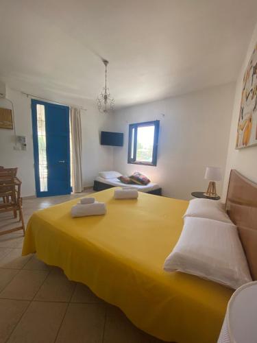 Ένα ή περισσότερα κρεβάτια σε δωμάτιο στο Villa Rilù