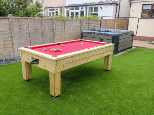 a pool table with balls on it in a yard at 71 Nutter Road in Cleveleys