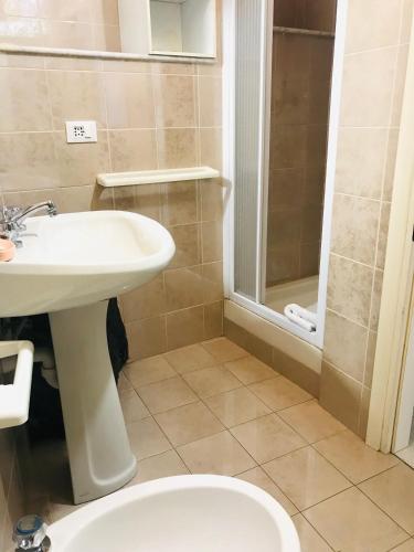 a bathroom with a toilet and a sink and a shower at Il Balconcino delle CinqueTerre in Vernazza