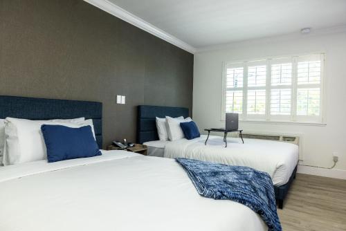 Кровать или кровати в номере WAFER 450 Hotel