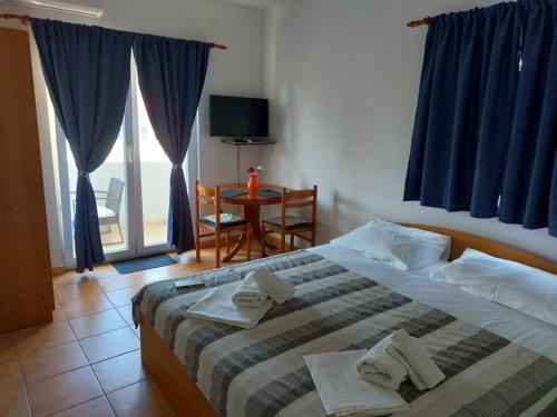 Posteľ alebo postele v izbe v ubytovaní Apartments Burcul Pag