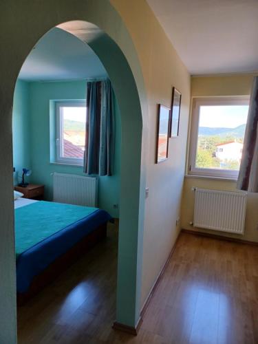 Postel nebo postele na pokoji v ubytování Apartman Alen