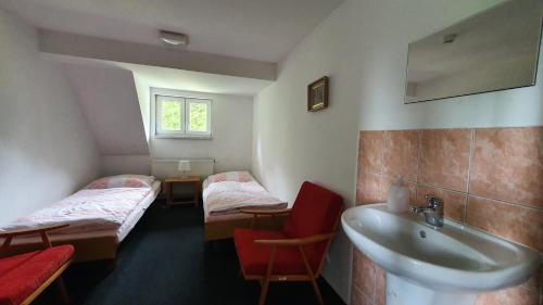 Postel nebo postele na pokoji v ubytování Chata Na Čiháku