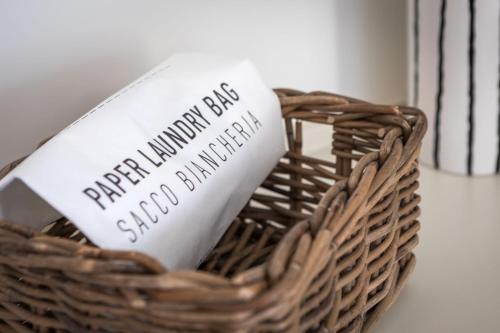 a wicker basket with a sign that says happy anniversary and slow dancing at Murè Hotel Numana in Numana
