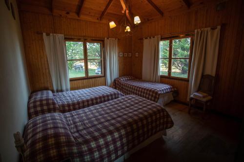 Tempat tidur dalam kamar di Posada Los Mimbres