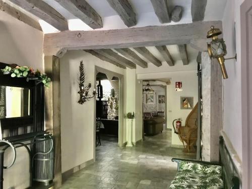 a hallway of a home with a ceiling at La Casona del Tío Pedro in Cadalso de los Vidrios