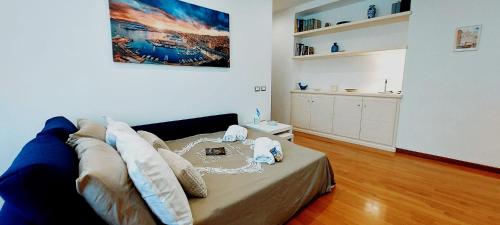 Кровать или кровати в номере Blue Apartment