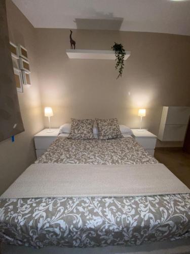 Ένα ή περισσότερα κρεβάτια σε δωμάτιο στο Robles home