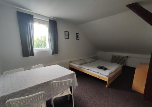 Ein Bett oder Betten in einem Zimmer der Unterkunft Pension U Johnů