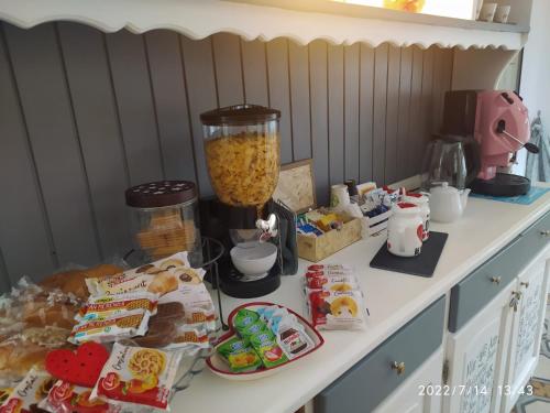 a counter with food and a blender on it at Casa vacanze San Giovanni nei Sassi in Matera