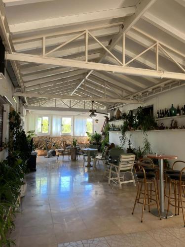 a large room with tables and chairs in it at Apartment with swimming pool in Jelsa