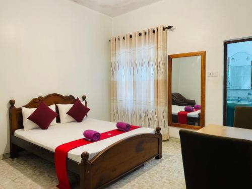 Postel nebo postele na pokoji v ubytování Ivana Homestay