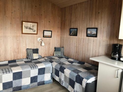 Postel nebo postele na pokoji v ubytování Thorsminde Camping & Cottages