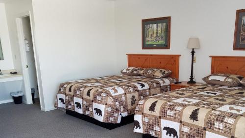Ένα ή περισσότερα κρεβάτια σε δωμάτιο στο Drop Tyne Lodge