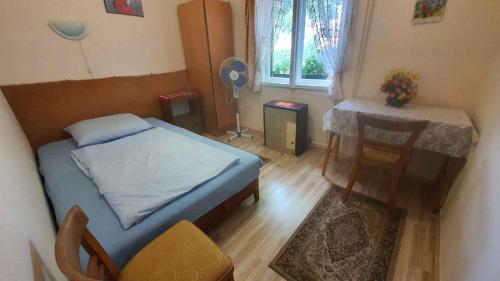 A bed or beds in a room at Holiday home in Siofok - Balaton 38173