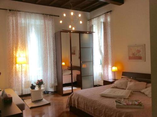 Posteľ alebo postele v izbe v ubytovaní Navona Square House