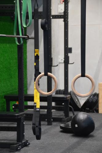 a gym with a pair of scissors and a ball at Cozy Stays Cayala Apartments (407) in Guatemala