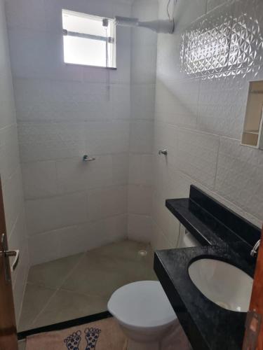 Kylpyhuone majoituspaikassa Kitnet Super