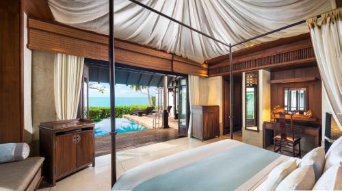 Ein Bett oder Betten in einem Zimmer der Unterkunft The Lamai Samui
