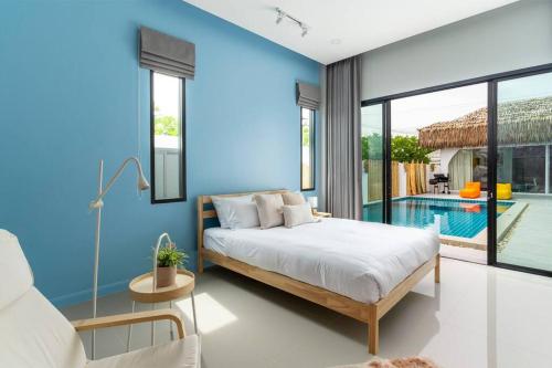 Cama ou camas em um quarto em HuaHin◆PaiMai PoolVilla◆4BR◆Karaoke by น้องมังคุด