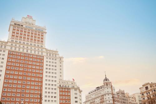 a group of tall buildings in a city at Riu Plaza España in Madrid