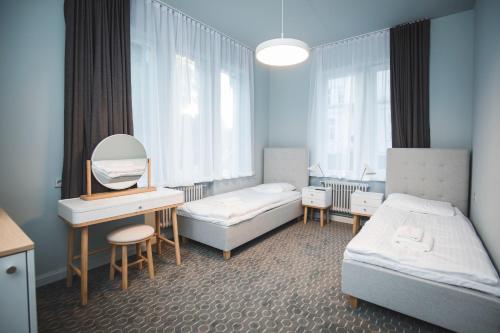 Кровать или кровати в номере Roze Park Rooms