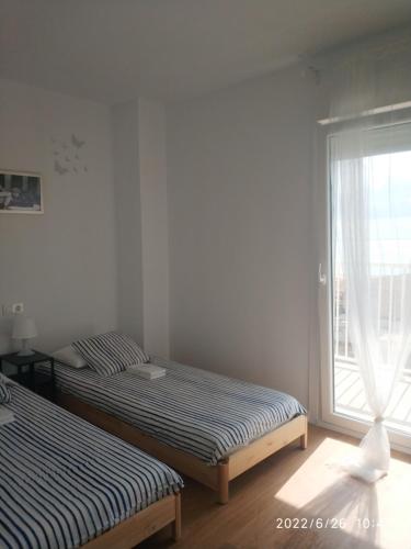 Posteľ alebo postele v izbe v ubytovaní Bonito apartamento con piscina cerca de la playa.