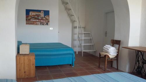Katil atau katil-katil dalam bilik di B&B Calabria