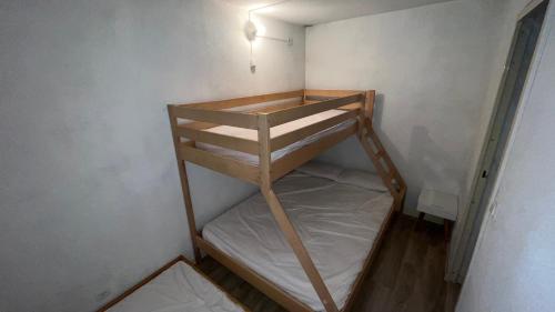 Postel nebo postele na pokoji v ubytování Font romeu logement 4 saisons