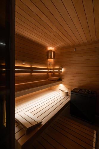 a sauna with a light on the inside of it at Apartmány Na Lánech in Litomyšl