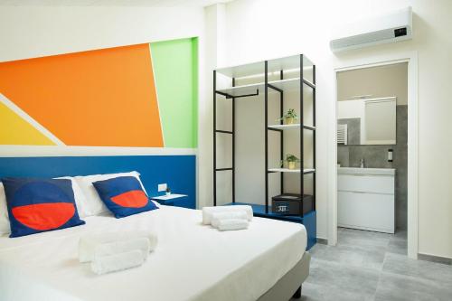 En eller flere senge i et værelse på Stalegro Residence