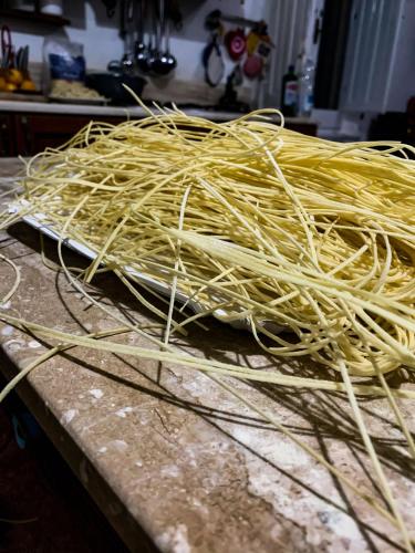 a pile of spaghetti sitting on top of a counter at Domo Achenza in Terralba