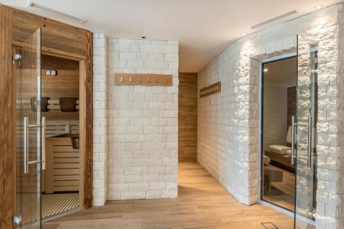Ένα μπάνιο στο Hotel Residence Gardena Dolomites 2