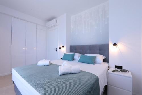 Postel nebo postele na pokoji v ubytování Villa Magic Sky II
