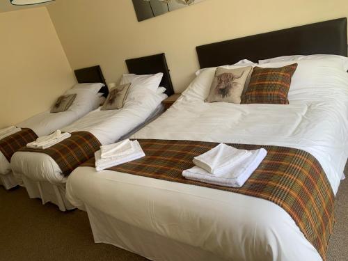 Ein Bett oder Betten in einem Zimmer der Unterkunft The Yew tree at Longhope